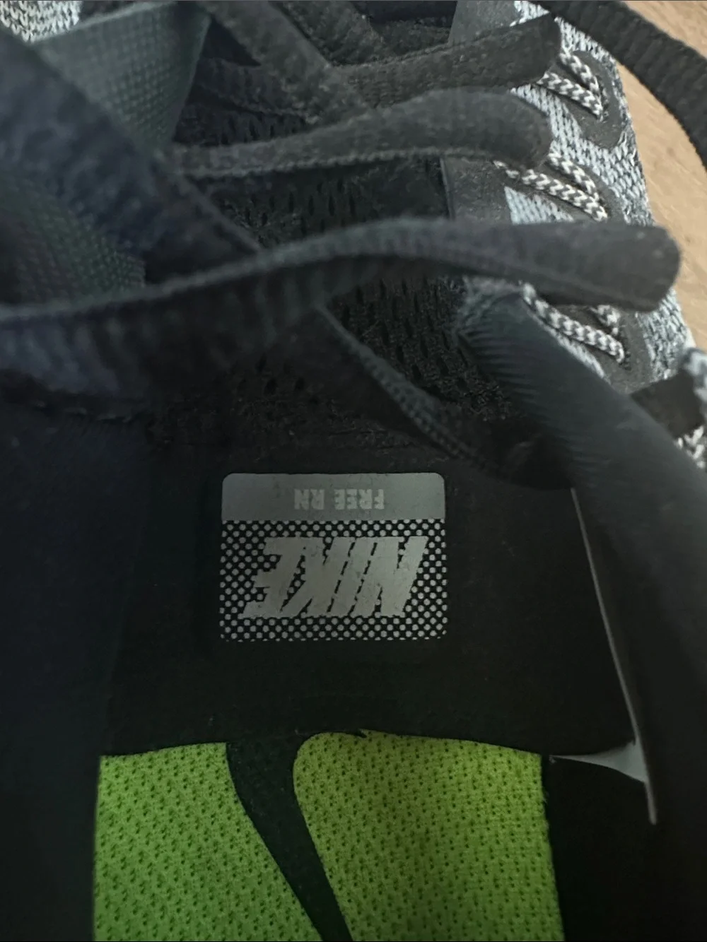 Nike Grey and Black Knit Sneakers with White Swoosh